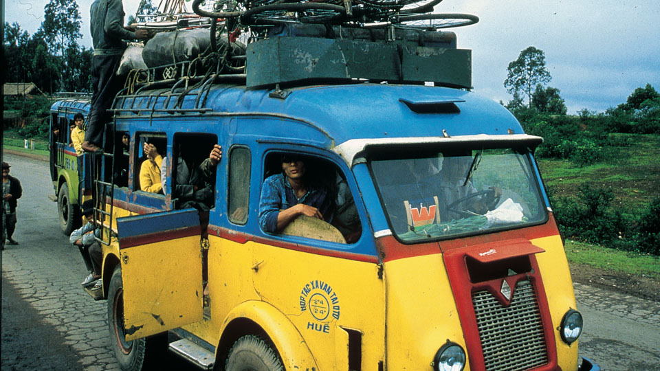 An old French packed tight on Highway 1 outside Hue in 1993